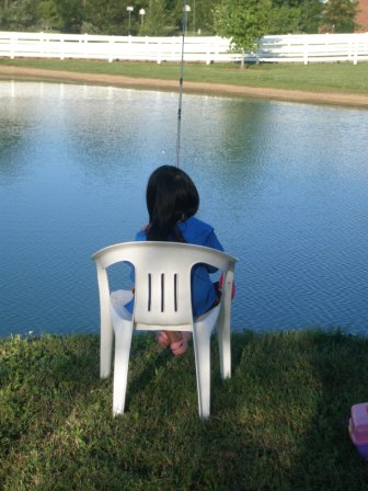 Kasen fishing in our pond